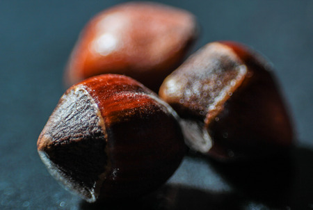 Heap of organic hazelnuts - selective focus macro shotの写真素材