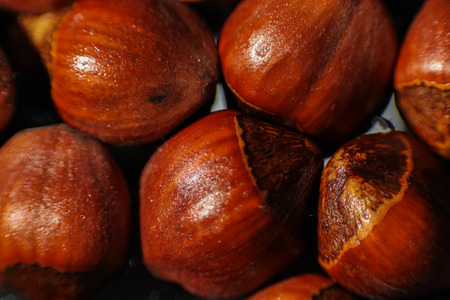 Heap of organic hazelnuts - selective focus macro shotの写真素材