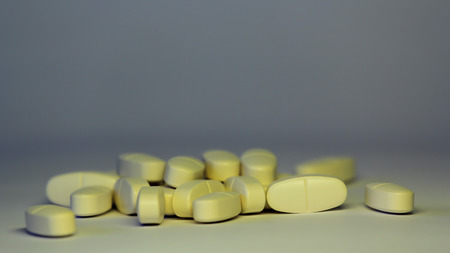 pills on a white background. symbolic photo for medicine and drugsの写真素材