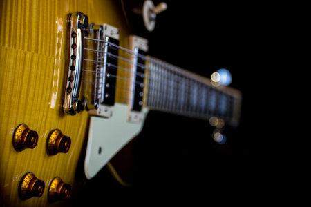 Electric guitar isolated on a black background