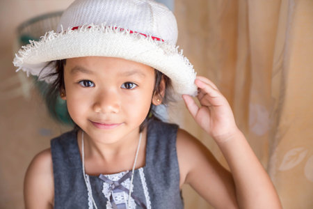 A happy girl with a beautiful smile of hope.の写真素材