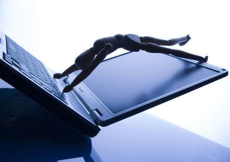 Laptop with figure over white background.