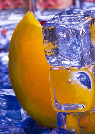 Orange with ice cubesの写真素材
