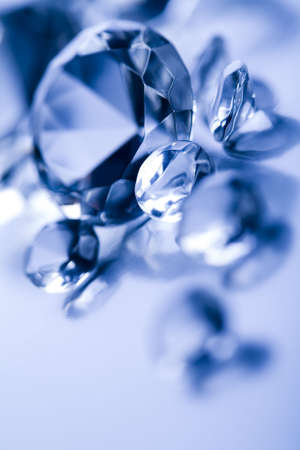 Diamonds isolated on blue background の写真素材