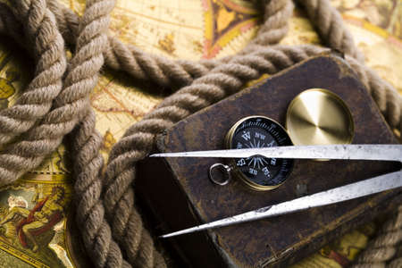 Old-fashioned compass on map の写真素材