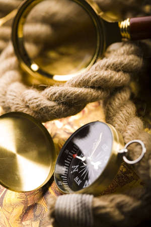 Magnifying glass and old map の写真素材