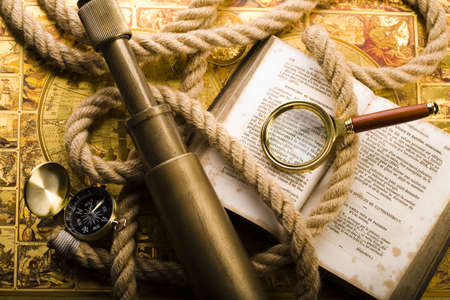 Magnifying glass and old map の写真素材