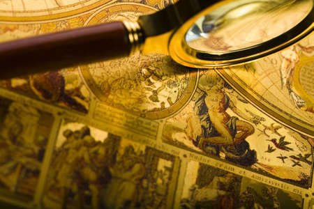 Magnifying glass and old map の写真素材