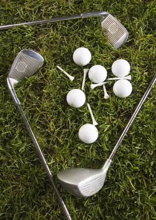 Golf ball on grass with driver 