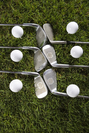 Golf club with ball on a tee の写真素材