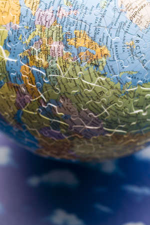 Globe made from puzzleの写真素材
