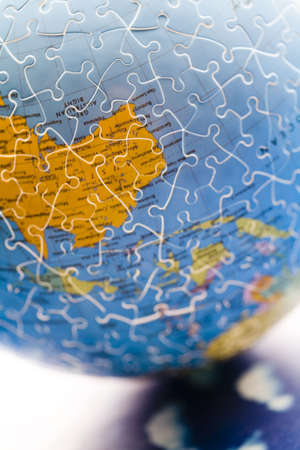Globe made from puzzleの写真素材