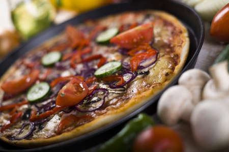 Vegetables with a pizzaの写真素材