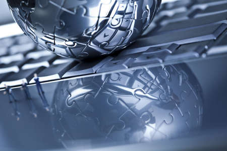 Laptop with figure over silver backgroundの写真素材