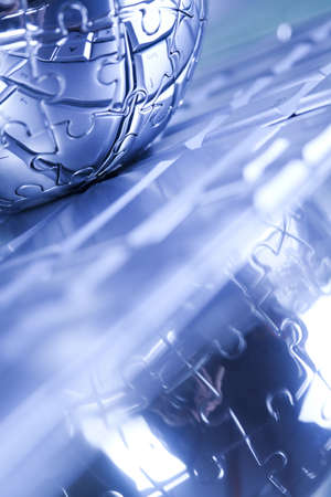 Globe made from puzzleの写真素材