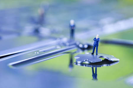 Puzzle and business manの写真素材