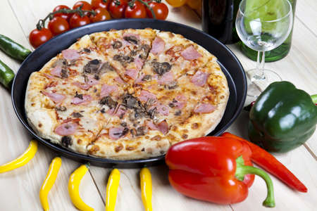 Fresh vegetables with a pizzaの写真素材