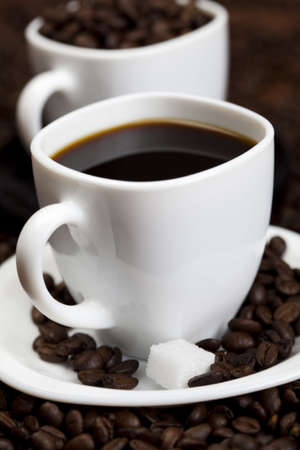 Coffee beans in a cupの写真素材