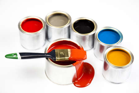 Cans and paint on the colourful backgroundの写真素材