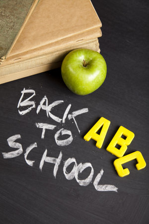 Apple on a chalkboard - healthy breakfast at school