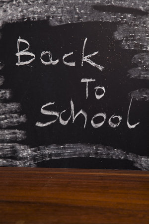 Back to school - inscription on blackboard 