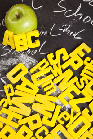 Apple and letters on a blackboard  の写真素材