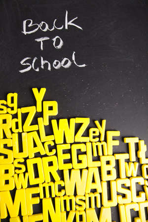 Alphabet and letters on a school blackboard の写真素材