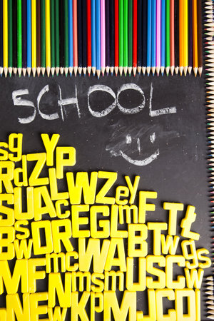 Pencils, alphabet and school