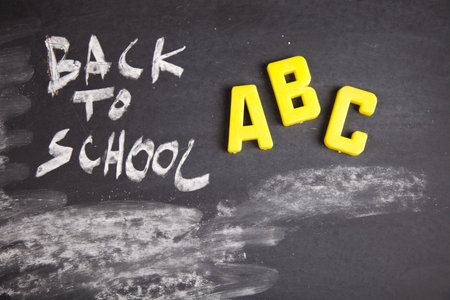 Inscription on a school chalkboard - back to school 