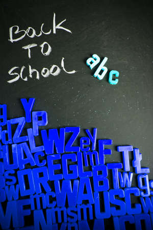 Alphabet and letters on a school blackboardの写真素材