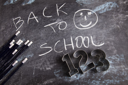 Back to school - inscription on blackboard 