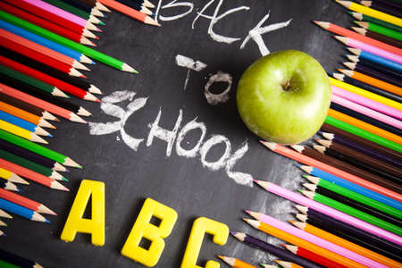 Apple, Colour pencils, Blackboard  の写真素材