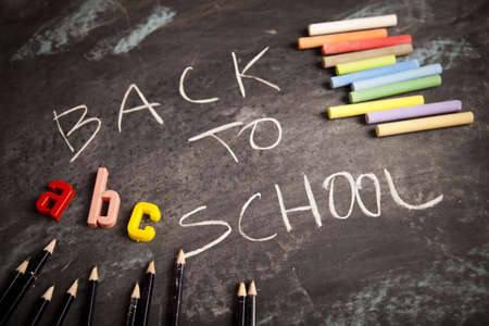 Inscription on a school chalkboard - back to schoolの写真素材