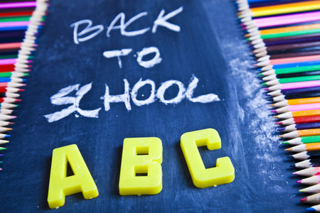 Colour pencils & Chalkboard の写真素材