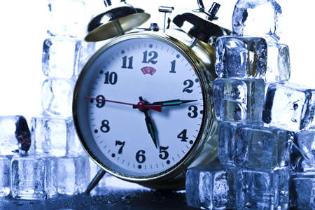 Classical Clock among ice cubesの写真素材