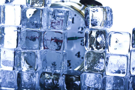 Classical Clock among ice cubes  の写真素材