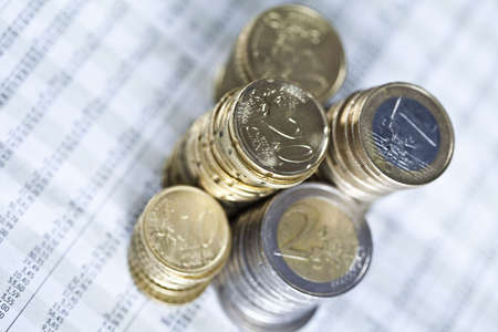 Euro coins and businessの写真素材