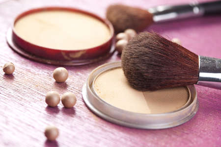 Face powder, make up powder on pink backgroundの写真素材