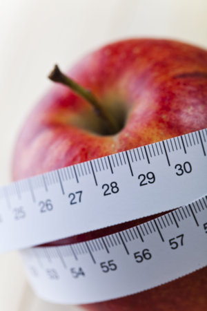 On diet - apple and tape measure