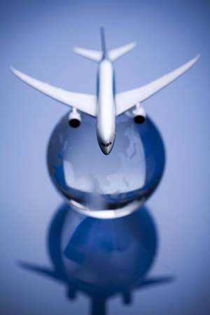 Airliner with earth in the blue backgroundの写真素材