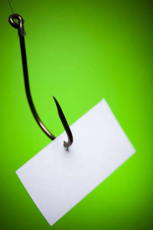 Blank on piece of paper on hookの写真素材