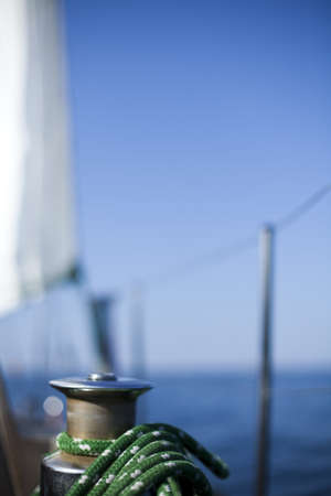 Winch with rope on sailing boat in the sea の写真素材