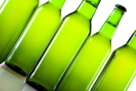 Bottles of beer against a white background の写真素材