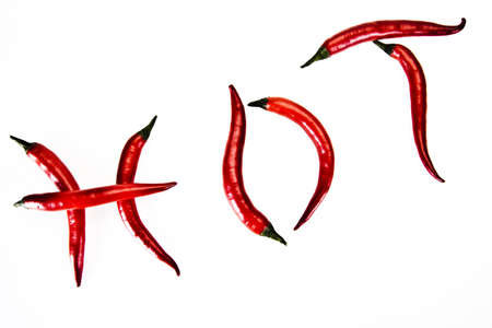 Red hot chili peppers on white background - hotの写真素材