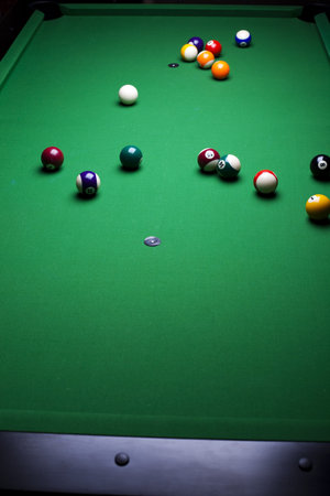 Pool game balls against a greenの写真素材