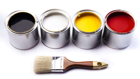 Cans of paint with paintbrushの写真素材