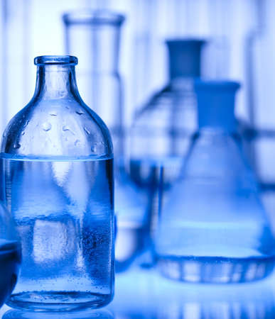 Test tubes on blue background の写真素材