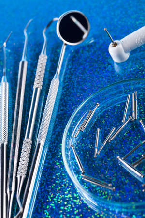 Dentist equipment on blue backgroundの写真素材