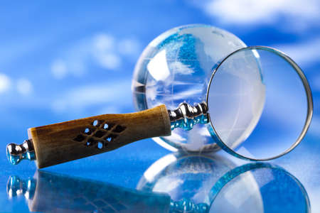 Magnifying glass and globeの写真素材