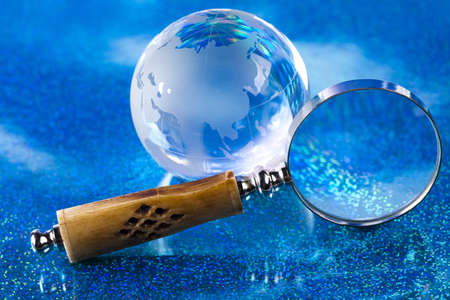 Magnifying glass and globeの写真素材